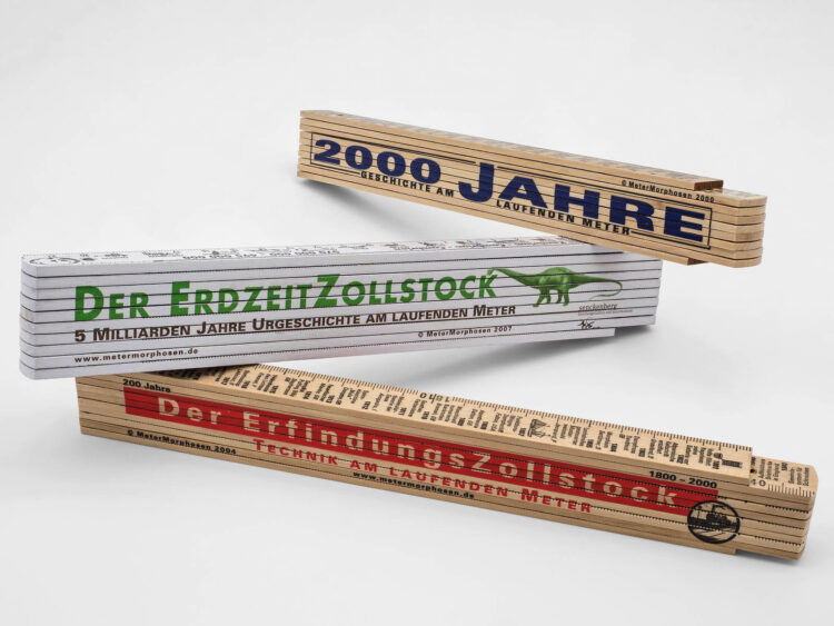 Zollstock in den drei Varianten 2000 Jahre Geschichte, Erdzeitalter und Erfindungen