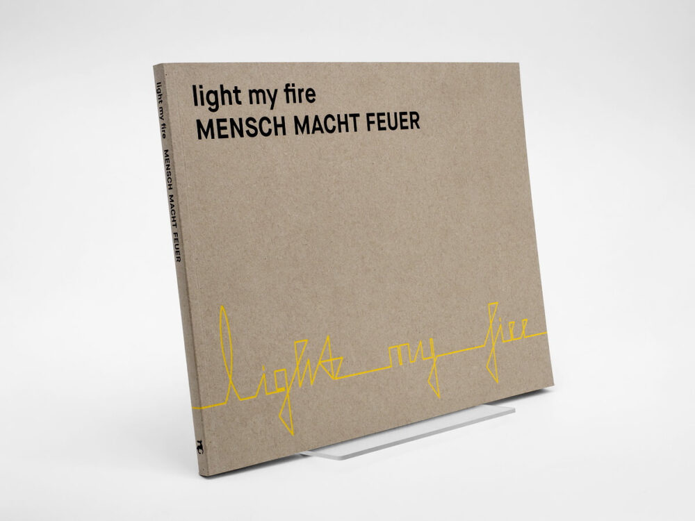 Buch light my fire. MENSCH MACHT FEUER herausgegeben von Michael Merkel
